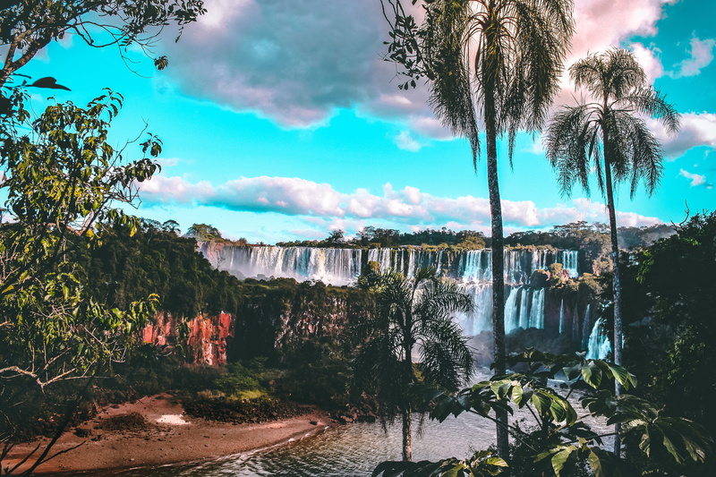 flowing water, palm tree, architecture, cloud - sky, scenics - nature, sea, argentina, light, tranquility, waterfall, summer, outdoors, beach, nature, scenery