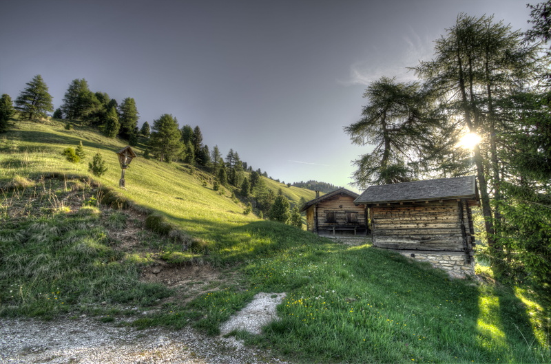 meadow, building exterior, countryside, wood, grass, dusk, dawn, green color, built structure, sky, cottage, architecture, landscape, environment, hill