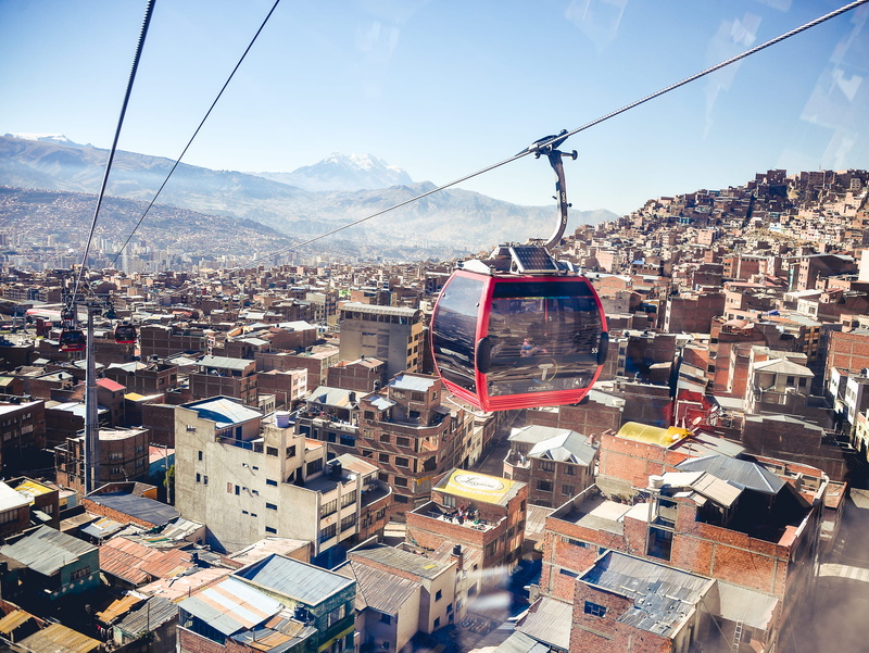 crowded, architecture, bolivium, nature, residential district, built structure, mountain, cityscape, teleferico, city, hanging, day, townscape, cable, tram