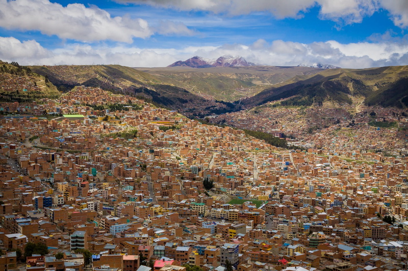 aerial, building, cityscape, view, residential district, mountain, cloud - sky, capital, la paz, la, architecture, built structure, mountain range, environment