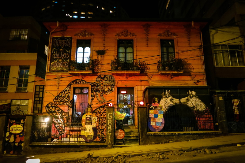 built structure, no people, communication, entrance, building exterior, mural, retail, windows, night, lighting equipment, building, architecture, building in la paz
