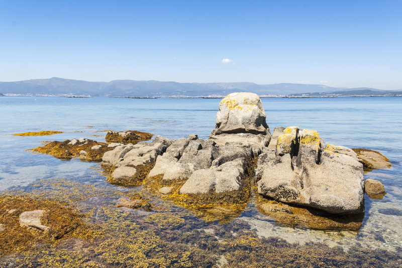 rock, stone, blue, rocks, tourism, shore, rock - object, tranquil scene, beach, geology, nature, no people, pontevedra, bay, sea, water, clear sky, landscape