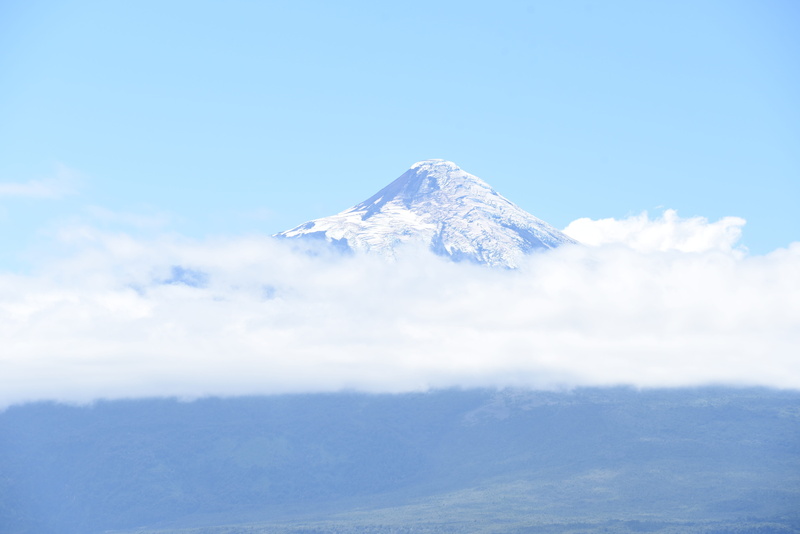 beauty in nature, volcano, nature, snow, blue, day, tranquility, lake llanquihue, sky, winter, tranquil scene, outdoors, no people, mountain peak, volcanic crater