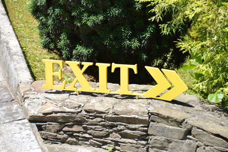 solid, stone wall, wall, no people, built structure, outdoors, text, architecture, growth, protection, Brexit, tree, graphic, rock, security, yellow, sign