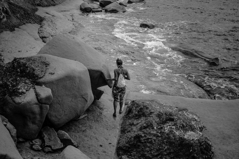 men, exotic, outdoors, leisure activity, land, adventure, landscape, grayscale, beach, rock, lifestyles, alone, rock - object, rocks, motion, high angle view