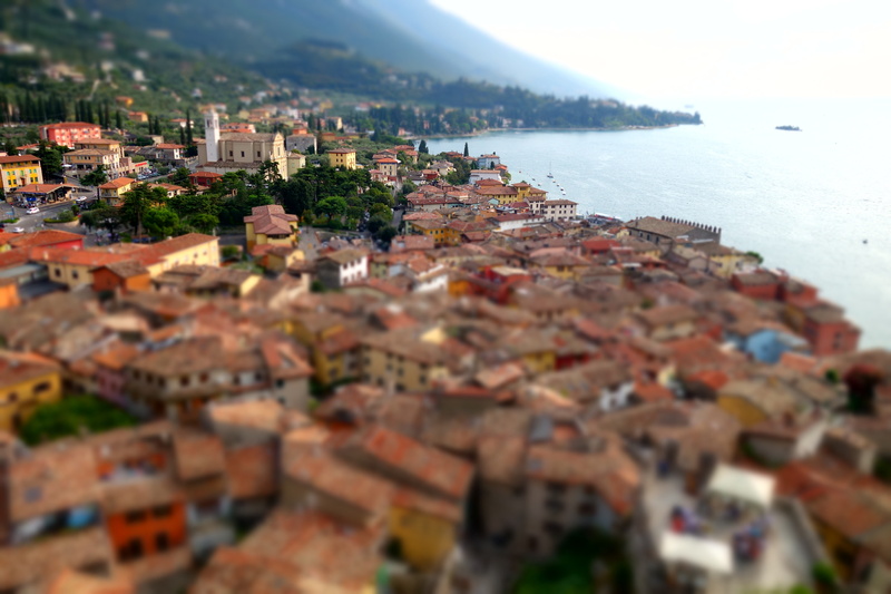 cityscape, ancient, tilt-shift, building exterior, nature, miniature, roof, church, town, selective focus, residential district, city, lake garda, day