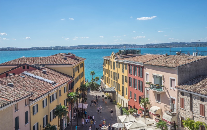 travel, red, street, roof, town, building exterior, sky, old, flowers, 5K, summer, sea, city, day, lake garda, sirmione, lombardy, high angle view, houses