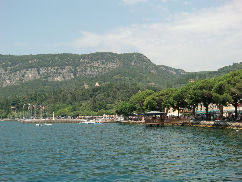 plant, sea, tree, architecture, Garda, built structure, outdoors, day, waterfront, nautical vessel, water, sky, nature, Italy, no people, summer, transportation