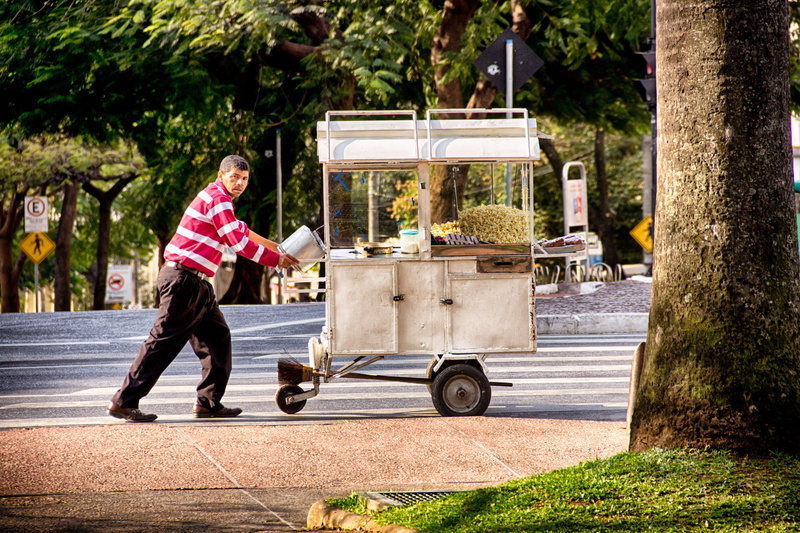 color, outdoors, people, 4K, full length, job, popcorn, street, one person, park, nature, transportation, brasil, mode of transportation, journal, casual clothing