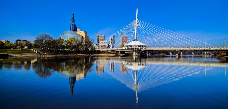 body, urban, landmark, skyscrapers, sky, city, travel, reflecting pool, water, building, tall, built structure, religion, reflection, near, place of worship