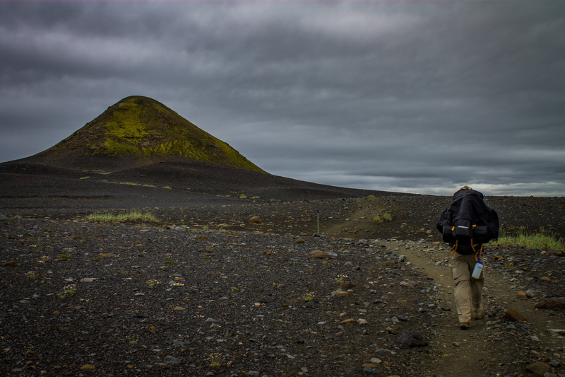 person, clouds, land, full length, near, climbing, walking, cloud - sky, overcast, backpack, non-urban scene, rocks, travel, travel destinations, man, scenics - nature