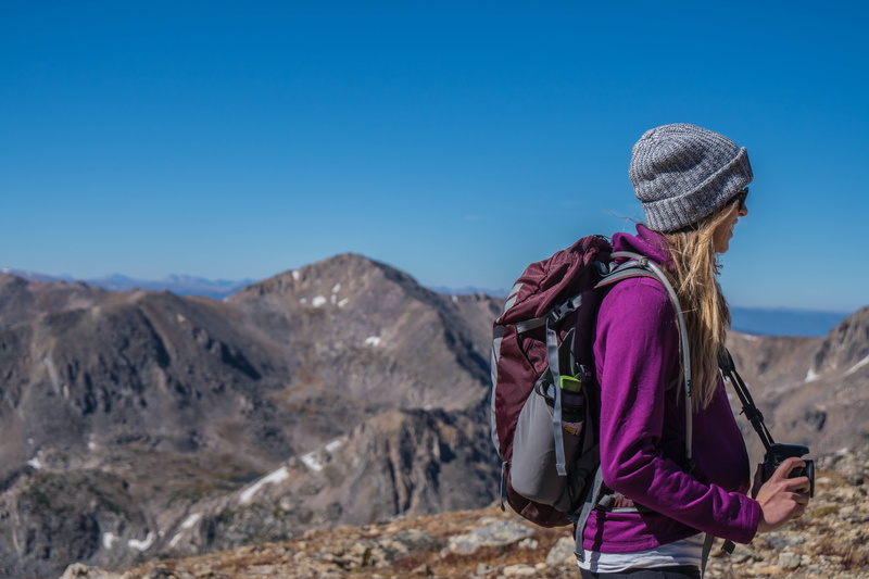 5K, travel destinations, activity, daytime, cliff, wearing, scenics - nature, woman, women, purple, looking at view, warm clothing, adult, people, scenics