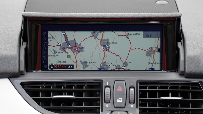 sign, transportation, land vehicle, number, indoors, communication, sat nav, control panel, wall - building feature, motor vehicle, power supply, close-up