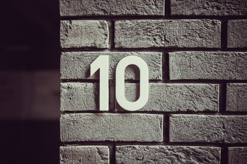 5K, black color, metal, wall - Building Feature, freestanding, outdoors, backgrounds, building exterior, numbers, sign, communication, textured, symbol