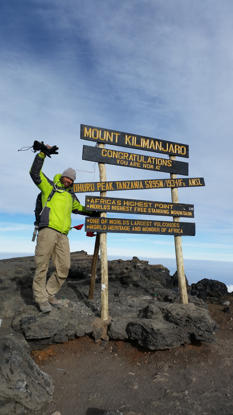 5K, communication, mountaineering, solid, at the top, text, rock - object, sky, western script, kilimanjaro, rock, people, lifestyles, mountain, man, men