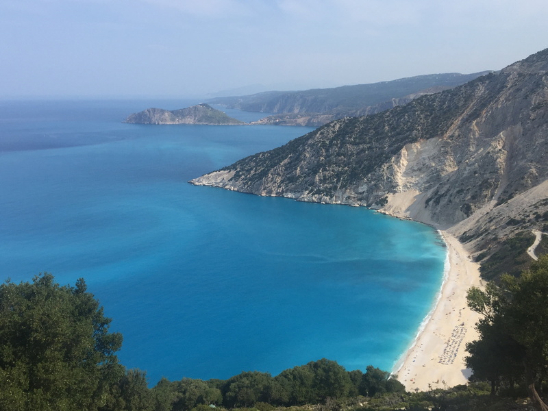 beach, beauty in nature, mountain, turquoise colored, bay, tranquility, no people, day, sky, scenics, high angle view, kefalonia, tranquil scene, non-urban scene