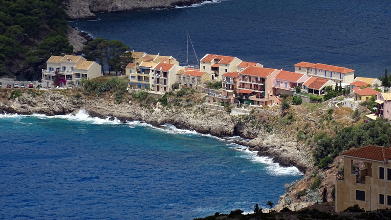 sea, high angle view, no people, village, tree, residential district, blue, building exterior, landscape, outdoors, house, assos, city, architecture, coastline
