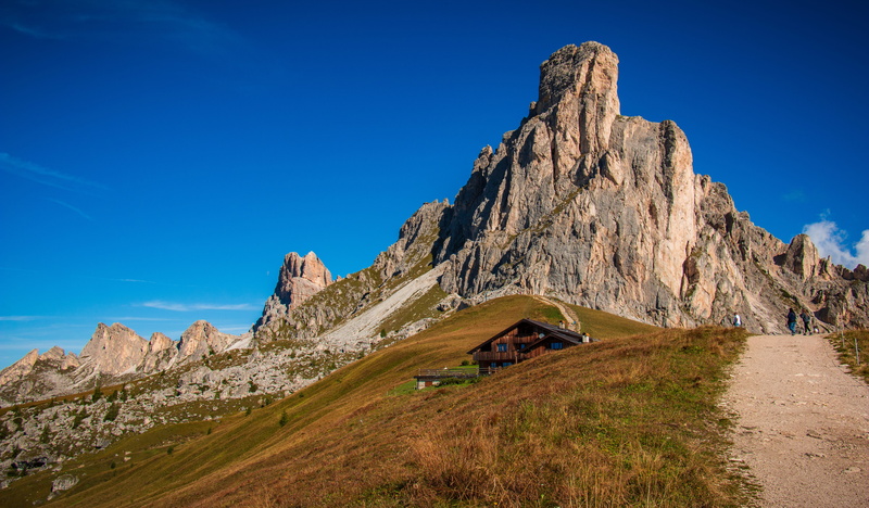 solid, rock - object, grass, sky, land, semi-arid, cliff, non-urban scene, mountain, giau, scenery, housing, slope, blu, rock, building, no people, tranquil scene