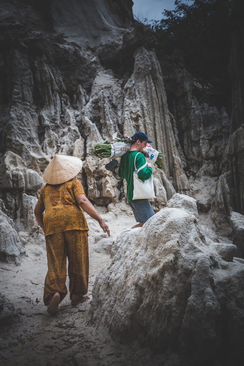 two people, assistance, carrying, 5K, solid, men, rock - object, carry, water, real people, people, beauty in nature, clothing, nature, outdoors, full length