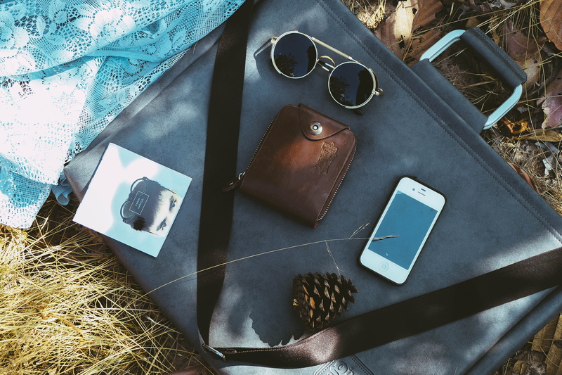 outdoors, 4K, day, iphone, high angle view, no people, bag, glasses, personal accessory, old, close-up, plant, fashion, sunglasses, directly above, still life