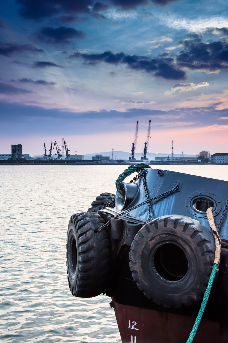 wheel, outdoors, skyscraper, connection, sky, river, boat, city, tug, built structure, transportation, industry, transport, travel, 5K, sunset, tire, no people
