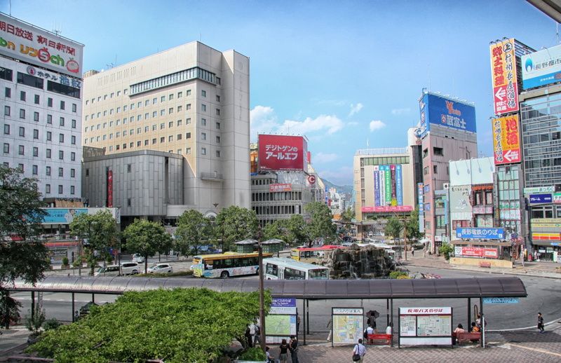 transportation, buildings, Skyline, car, built structure, incidental people, day, streets, building, building exterior, outdoors, traffic, plant, city