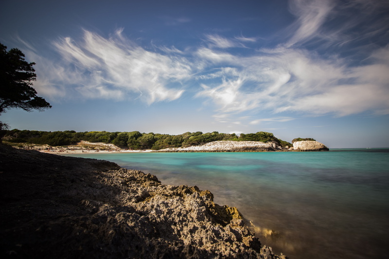 sperone, non-urban scene, bonifacio, forest, turquoise colored, sky, beach, outdoors, plage du petit sperone, beauty in nature, corsica, cloud - sky, rock - object