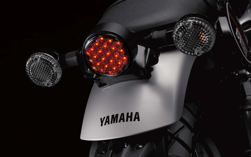 motor vehicle, red, luxury, scr, gray, no people, text, sign, close-up, Yamaha, communication, equipment, microphone, indoors, mode of transportation, studio shot