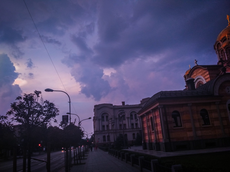 background, cloud - sky, building exterior, bosnia and herzegovina, incidental people, cloud, tree, building, road, sunset, travel, town, nature, city