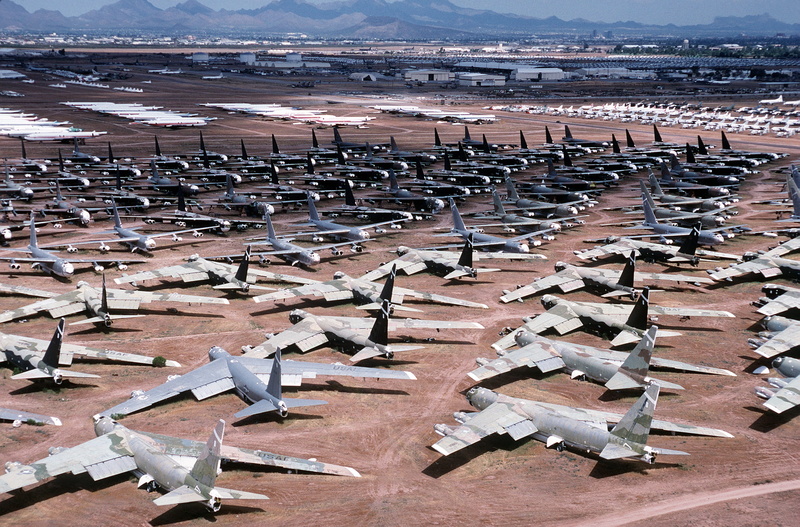 field, repetition, outdoors, boneyard, military, aviation, daytime, nature, order, table, planes, amarc, Storage, water, large group of objects, B-52S