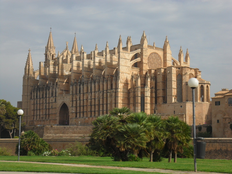 place of worship, built structure, cloud - sky, spirituality, religion, mallorca, outdoors, tree, building, nature, cathedral, de, plant, the past, belief