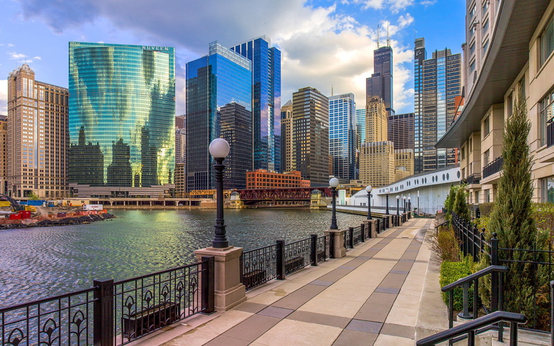 bridge - man made structure, promenade, cloud - sky, cityscape, building, office building exterior, urban, skyscraper, financial district, modern, outdoors