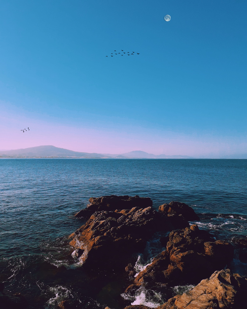 non-urban scene, blue sky, 2K, rock - object, seaside, rock, tranquil, tranquil scene, photography, flying, oceanshore, land, beach, beauty in nature