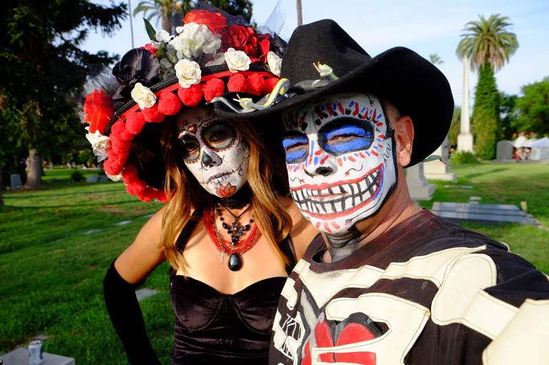 clothing, death, outdoors, leisure activity, looking at camera, halloween, celebration, costume, flowers, performance, real people, portrait, people, scary