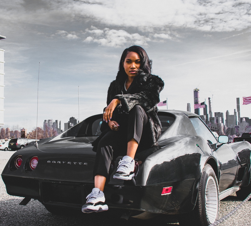 real people, parked, pose, lady, woman, female, sky, faux fur, looking, wear, beautiful woman, young women, auto, fashionable, leather jacket, rubber shoes