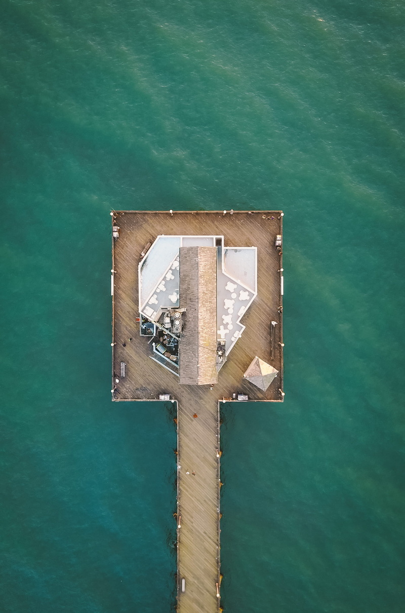 aerial, wooden, ocean, nature, platform, drone, high angle view, brown, day, shape, wall - building feature, 2K, birds, outdoors, oceanside, sea, dock
