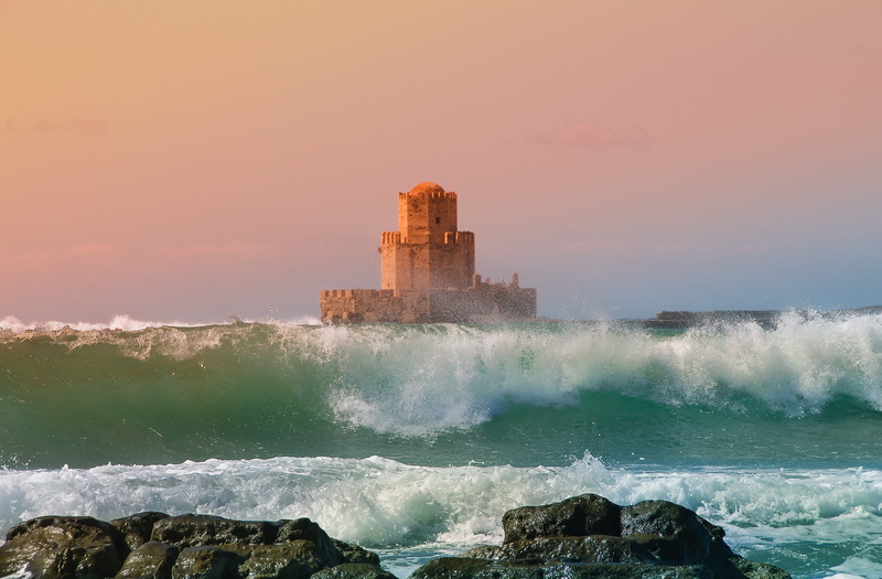 castle, middle, power in nature, water, beauty in nature, sunset, sport, power, ocean, beach, architecture, sea, aquatic sport, case, outdoors, solid, rock