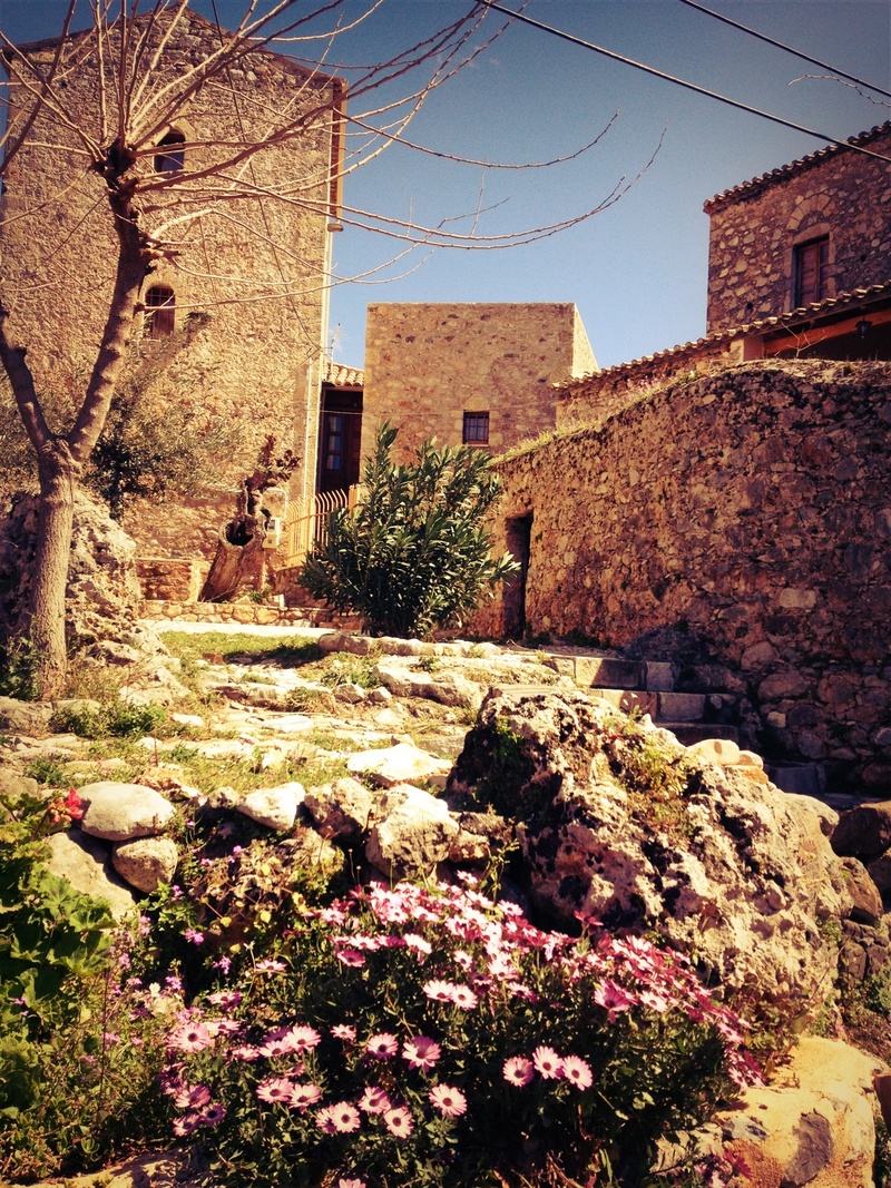 stone wall, day, peloponnese, low angle view, built structure, outdoors, greece, mani, residential district, building exterior, stone, nature, sunlight