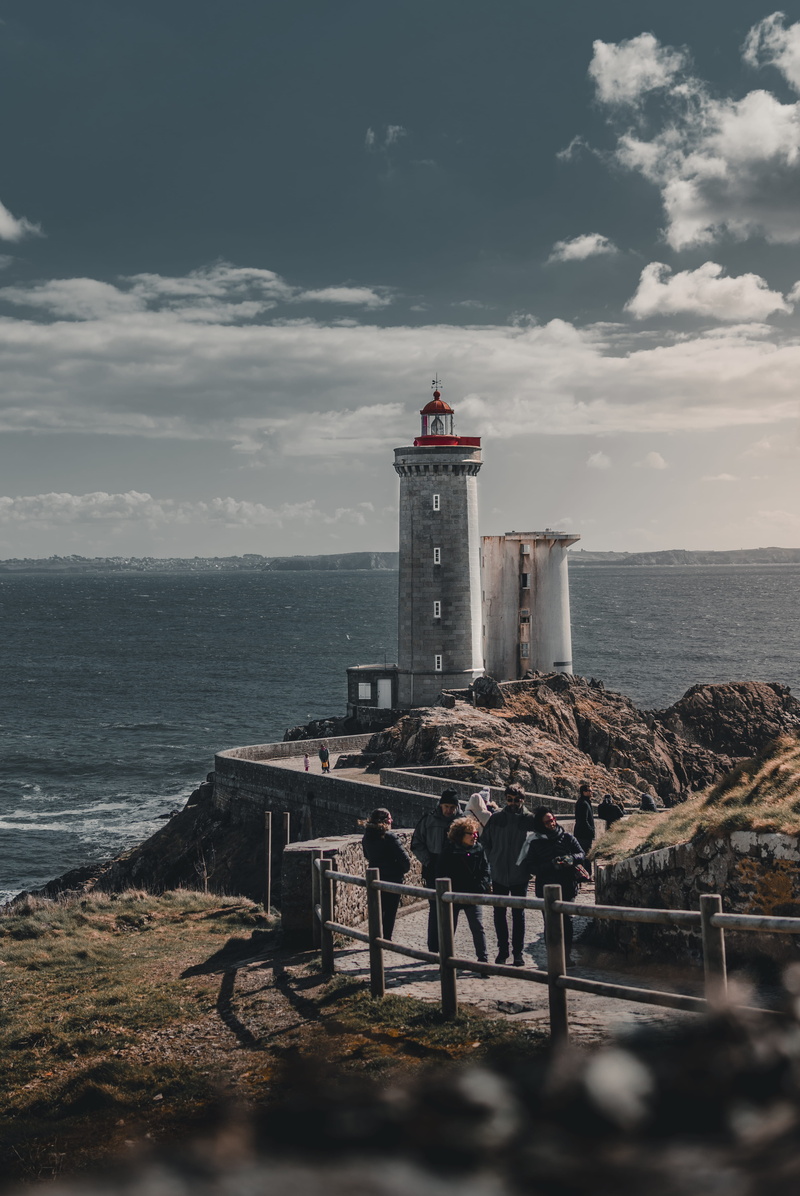 outdoors, lighthouse, direction, guidance, protection, horizon over water, land, railing, beach, beacon, moody, people, human, building exterior, 5K, towards