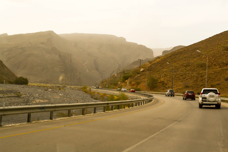 outdoors, crash barrier, 4K, diminishing perspective, oman, road trip, highway, street, motor vehicle, sign, the way forward, day, road, sky, mountain