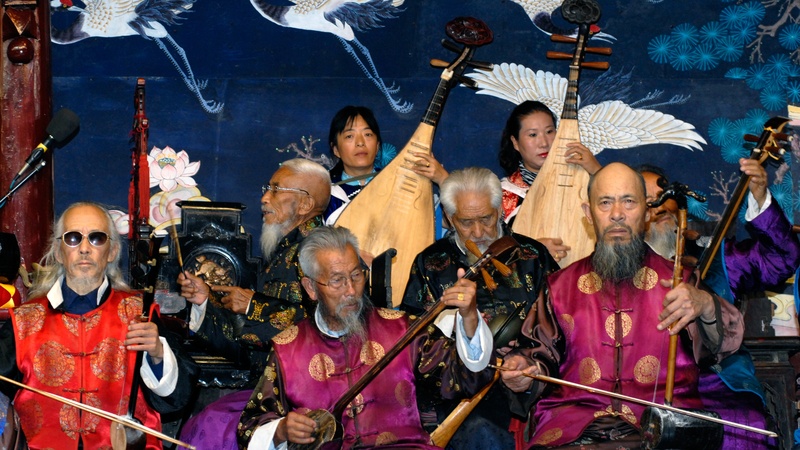 adult, group, real people, crowd, casual clothing, standing, women, traditional-music, front view, orchestra, china, people, looking at camera, playing
