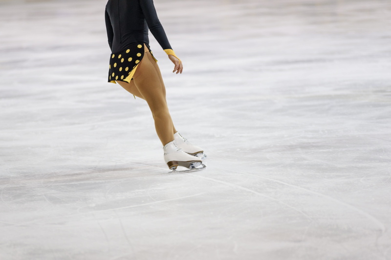 winter sport, body part, motion, shoe, skating, girl, human limb, figure skater, lifestyles, skates, day, one person, ice skating rink, activity, legs