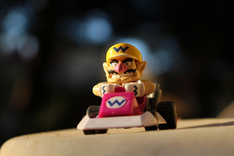 figurine, happiness, selective focus, white, 2K, figure, one person, childhood, fictional person, human representation, representation, competition, indoors