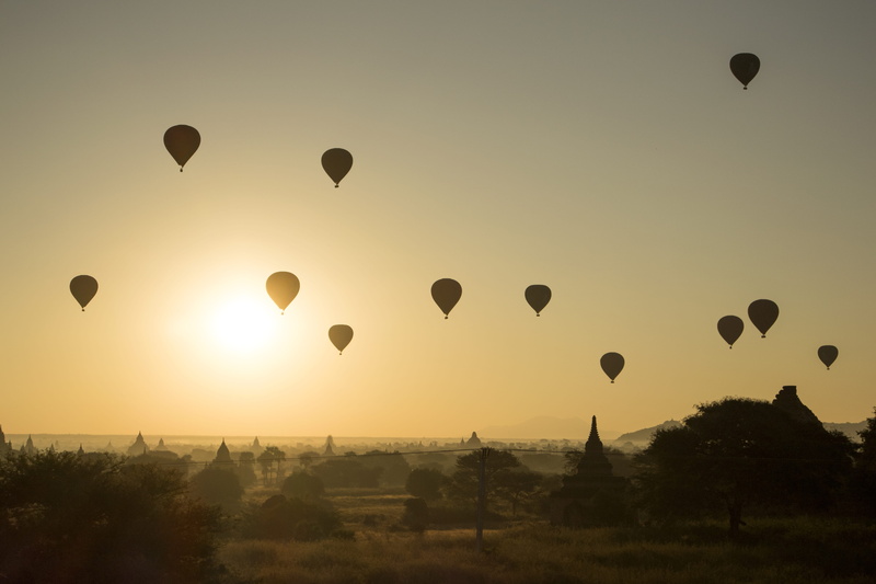 sun, mid-air, transportation, travel, air vehicle, ballooning festival, outdoors, travel destinations, sulamani temple, balloon, architecture, mode of transportation