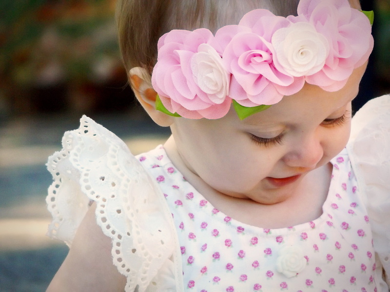 girls, head dress, outdoors, dress, 4K, baby Girls, dots, focus on foreground, happiness, close-up, flowering plant, cute, vulnerability, smile, childhood