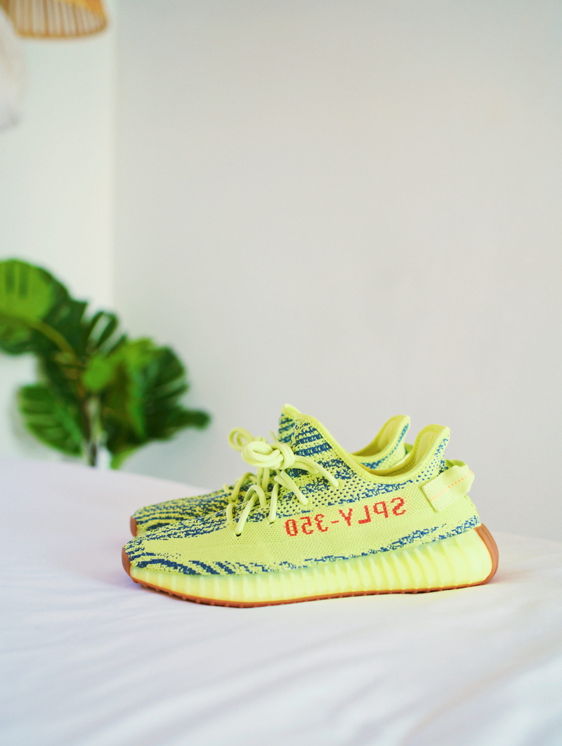 yeezy, healthy eating, communication, 2K, tape measure, nature, studio shot, yellow, focus on foreground, food and drink, frozen, adidas, bedspread, close-up
