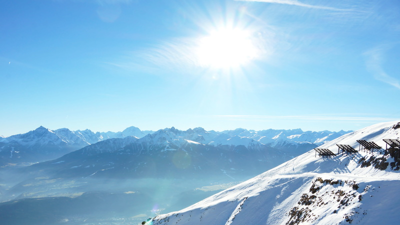 innsbruck, sunbeam, snowcapped mountain, no people, mountain peak, innsbruck stadium, nature, mountain range, sunlight, mountain, sky, sun, snow, environment