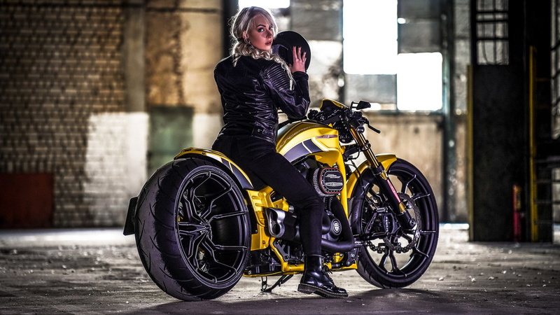 curly hair, long hair, black clothing, garages, helmet, looking over shoulder, women with motorcycles, women with bikes, sitting, Doc Martens, custom, motorcycle