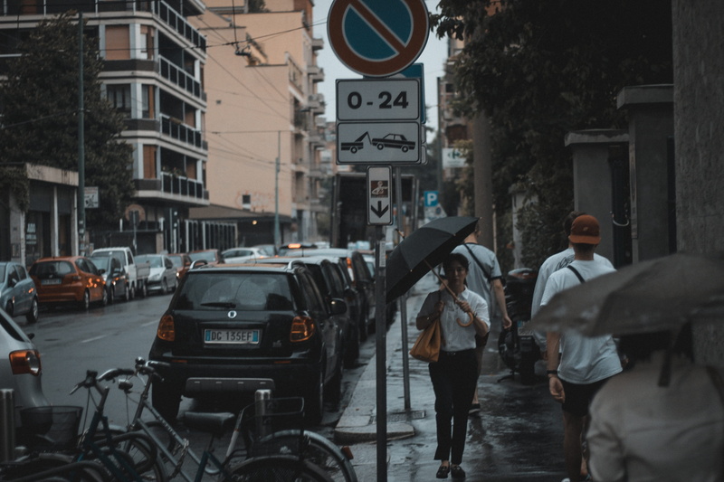 urbanlife, motor vehicle, milan, people, wet, days, mode of transportation, streetphotography, men, road, 5K, rear view, cars, rainy season, streetscape