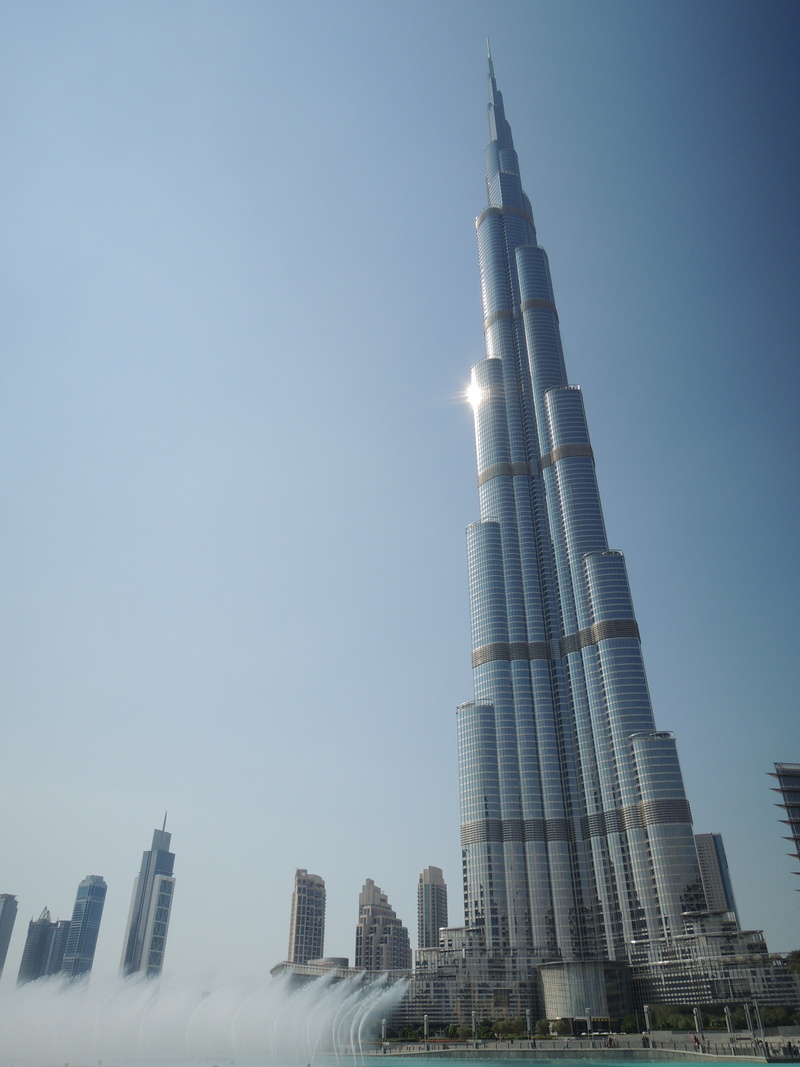 office building exterior, office, desert, travel, skyscraper, financial district, tower, low angle view, day, building exterior, outdoors, emirate, sky